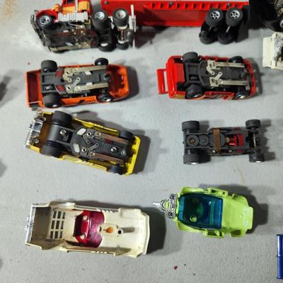 Large Lot of AFX Slot Cars and Trucks w 2 hard shell cases