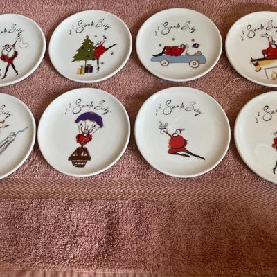 Pottery Barn coasters and red dish with yellow edge