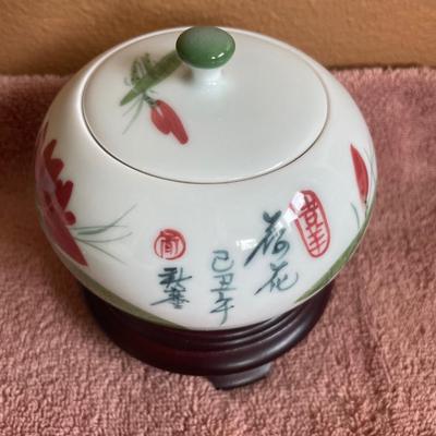 Floral stoneware and porcelain Asian jar