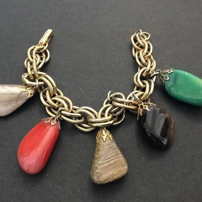 Beautiful, vintage, multi precious stone charm bracelet. I hate that.