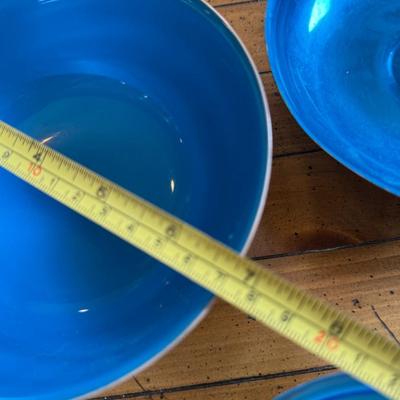 Sale Photo Thumbnail #173: Striking set of three mid-century silver-toned footed bowls with vibrant blue glass interiors. Unique accent bowls or serving pieces.