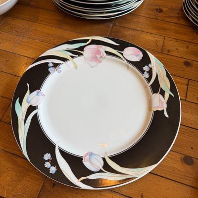 Sale Photo Thumbnail #182: Elegant porcelain dinnerware with black border and soft pink tulip pattern. Service for 4–6 includes plates, bowls, mugs, and serving pieces. Marked "Westbrook Collections - Mirage - Japan".