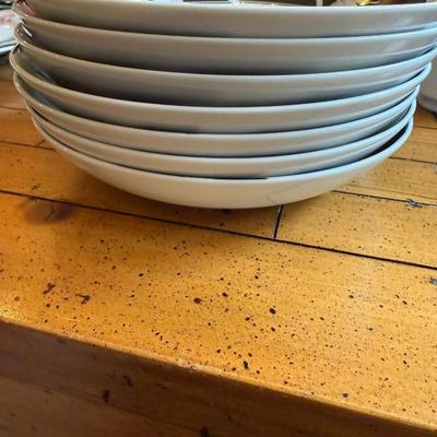 Sale Photo Thumbnail #178: Elegant porcelain dinnerware with black border and soft pink tulip pattern. Service for 4–6 includes plates, bowls, mugs, and serving pieces. Marked "Westbrook Collections - Mirage - Japan".