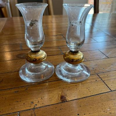Sale Photo Thumbnail #197: Elegant pair of fluted glass bud vases with gold tone bases. Vintage charm with minor patina.