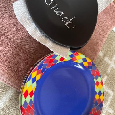 Snack bowl and colorful plates with candle stick holders