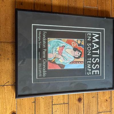 Sale Photo Thumbnail #245: Framed exhibition poster from Fondation Pierre Gianadda highlighting Matisse. Compact, bold design.