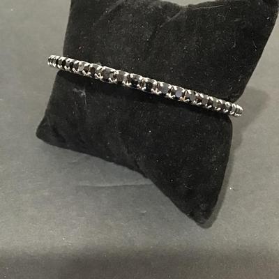 Very pretty Black glass rhinestone bangle bracelet. Very nice.
