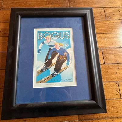 Sale Photo Thumbnail #326: Whimsical ski-themed art print from local artist Ward Hooper. Framed in bold black with blue matting.