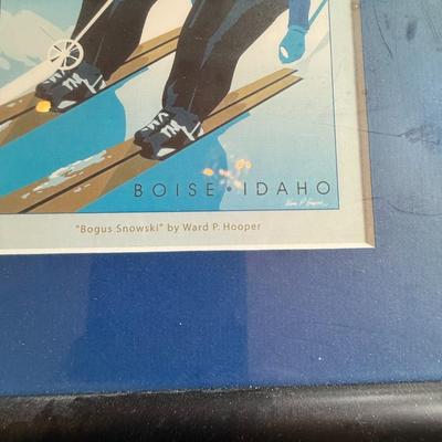 Sale Photo Thumbnail #327: Whimsical ski-themed art print from local artist Ward Hooper. Framed in bold black with blue matting.