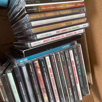 Variety of CDs and cassette tapes