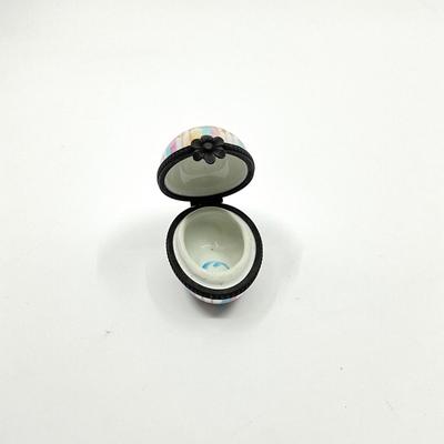 Sale Photo Thumbnail #584: Signed by M.C.
Measurements:
2" in length, 1.75" in height