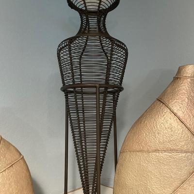 Gold vases with black wire decor