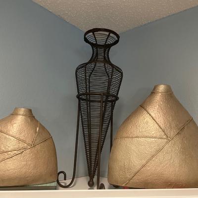 Gold vases with black wire decor