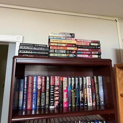 Sale Photo Thumbnail #370: Large collection of bookshelves filled with hardcover novels – multiple authors including Koontz, Kellerman, and Grisham