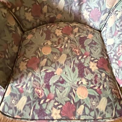 Sale Photo Thumbnail #376: Traditional upholstered armchair with floral pattern and wooden legs. Comfortable and sturdy.