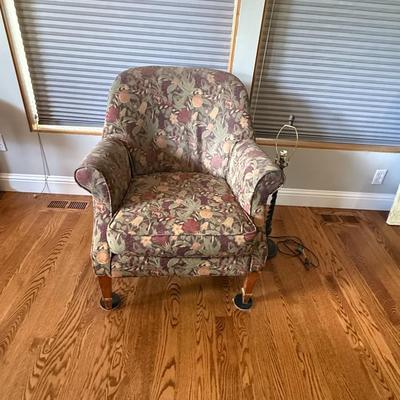 Sale Photo Thumbnail #375: Traditional upholstered armchair with floral pattern and wooden legs. Comfortable and sturdy.