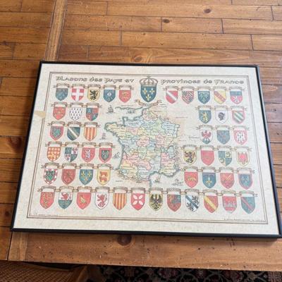 Sale Photo Thumbnail #385: Detailed wall art featuring shields and map of France's provinces. A collector’s piece with vintage appeal.
