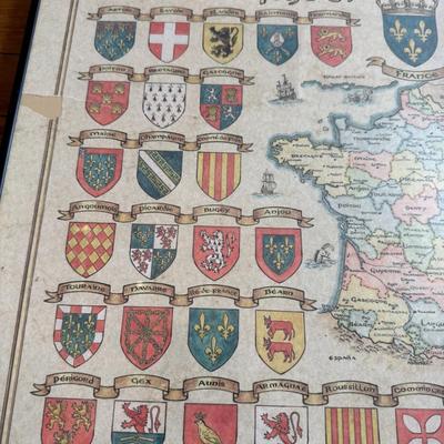 Sale Photo Thumbnail #386: Detailed wall art featuring shields and map of France's provinces. A collector’s piece with vintage appeal.