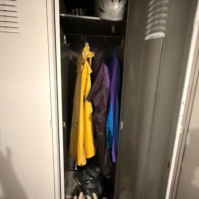 Sale Photo Thumbnail #429: Sturdy and functional metal locker unit with three tall compartments. Classic industrial design with vented doors, each with its own handle and latch. Shows minor cosmetic wear consistent with age but fully usable. Great for garage storage, mudroom organi