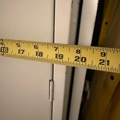 Sale Photo Thumbnail #428: Sturdy and functional metal locker unit with three tall compartments. Classic industrial design with vented doors, each with its own handle and latch. Shows minor cosmetic wear consistent with age but fully usable. Great for garage storage, mudroom organi