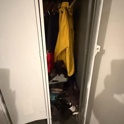 Sale Photo Thumbnail #430: Sturdy and functional metal locker unit with three tall compartments. Classic industrial design with vented doors, each with its own handle and latch. Shows minor cosmetic wear consistent with age but fully usable. Great for garage storage, mudroom organi