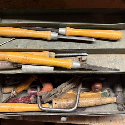 Sale Photo Thumbnail #442: Metal tool box loaded with assorted vintage hand tools including files, chisels, hammers, and specialty items. Ideal for collectors or garage use.