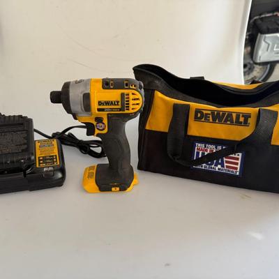 Sale Photo Thumbnail #445: Includes DeWalt 20V Max impact driver, charger, and tool bag. USA-labeled. Light signs of use, works great.