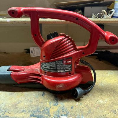 Sale Photo Thumbnail #451: Toro electric leaf blower, compact design with excellent blowing power.