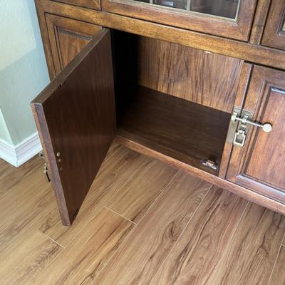 Sale Photo Thumbnail #5: Century furniture Raymond k Sabota China hutch/cabinet. Dimensions: 60”w x 16”d x 76.5”h. Inside the top part are two glass shelves. Piece does not come apart for transport and is very heavy. In very good/excellent condition with no known defects.