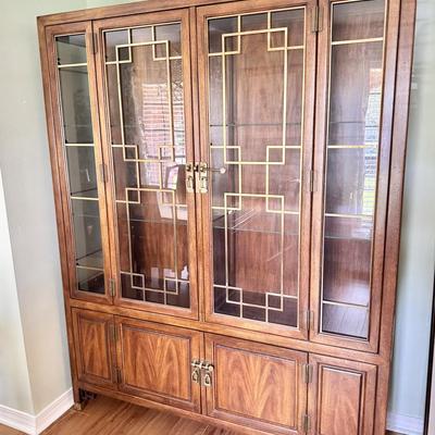 Sale Photo Thumbnail #1: Century furniture Raymond k Sabota China hutch/cabinet. Dimensions: 60”w x 16”d x 76.5”h. Inside the top part are two glass shelves. Piece does not come apart for transport and is very heavy. In very good/excellent condition with no known defects.