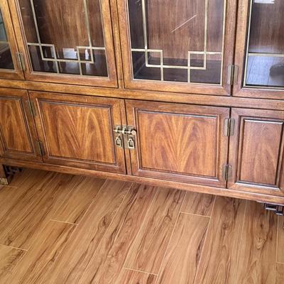 Sale Photo Thumbnail #2: Century furniture Raymond k Sabota China hutch/cabinet. Dimensions: 60”w x 16”d x 76.5”h. Inside the top part are two glass shelves. Piece does not come apart for transport and is very heavy. In very good/excellent condition with no known defects.
