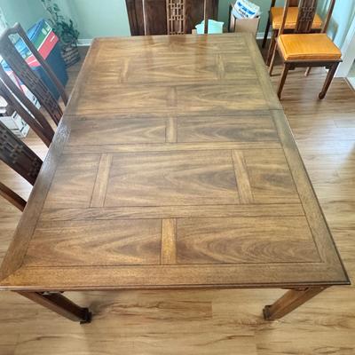 Sale Photo Thumbnail #9: Century Furniture fretwork dining table. Solid wood. Dimensions: 66”l x 44”w x 30”h (26”h under lip). Comes with two leaves that are 18”w. When both are in the table is 102”long. In very good/excellent condition with no known defects.