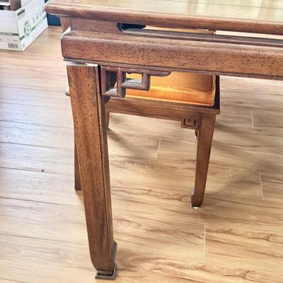 Sale Photo Thumbnail #10: Century Furniture fretwork dining table. Solid wood. Dimensions: 66”l x 44”w x 30”h (26”h under lip). Comes with two leaves that are 18”w. When both are in the table is 102”long. In very good/excellent condition with no known defects.