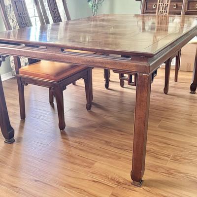 Sale Photo Thumbnail #7: Century Furniture fretwork dining table. Solid wood. Dimensions: 66”l x 44”w x 30”h (26”h under lip). Comes with two leaves that are 18”w. When both are in the table is 102”long. In very good/excellent condition with no known defects.