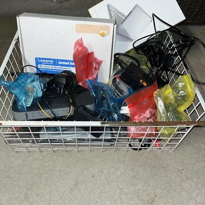 Sale Photo Thumbnail #152: Large metal basket with routers, cables and more