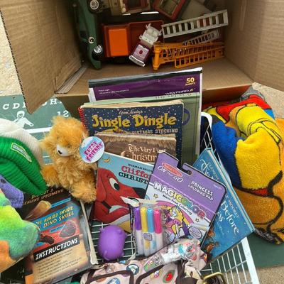Sale Photo Thumbnail #286: Large metal basket full of misc toys, a ninja turtle beach towel, Minecraft blanket, box of old firetrucks and vintage chalkboard