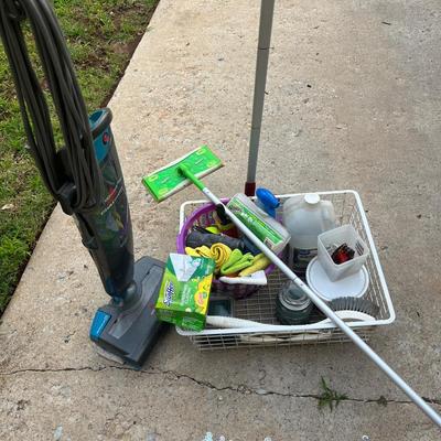 Sale Photo Thumbnail #293: Large metal basket full of cleaning supplies, Bissel Steam&Sweep, Swiffer with box of refills, microfiber towels and other cleaning items