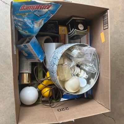 Sale Photo Thumbnail #312: All kinds of light bulbs, cleaning container with paint brushes, tin box and more