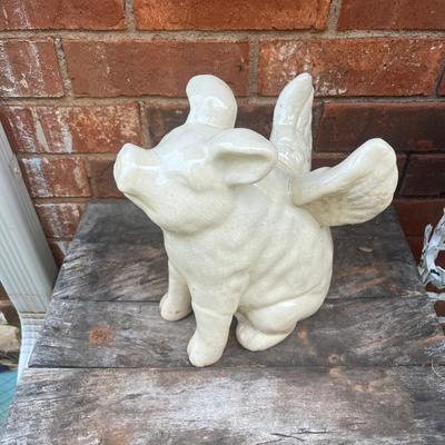 Sale Photo Thumbnail #379: Ceramic pig with wings statue
