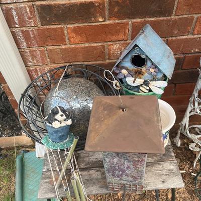 Sale Photo Thumbnail #383: Bird house, bird feeder, iron basket, windchime, gazing ball (that's seen better days but still pretty) and couple of small pots