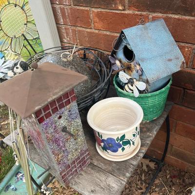Sale Photo Thumbnail #384: Bird house, bird feeder, iron basket, windchime, gazing ball (that's seen better days but still pretty) and couple of small pots