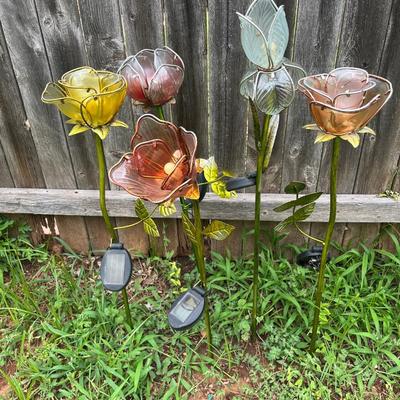 Sale Photo Thumbnail #443: Solar light stakes, do not currently work but doesn't mean they wouldn’t with a new battery and they still look pretty in the garden