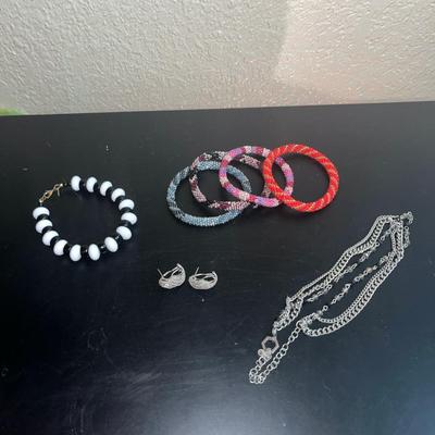 Sale Photo Thumbnail #592: Beaded bracelets, choker necklace and earrings
