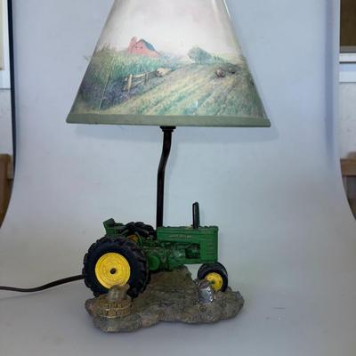 Sale Photo Thumbnail #30: Unique country-style lamp featuring a John Deere base and painted shade with farm landscape. A must-have for rustic or vintage decor lovers.