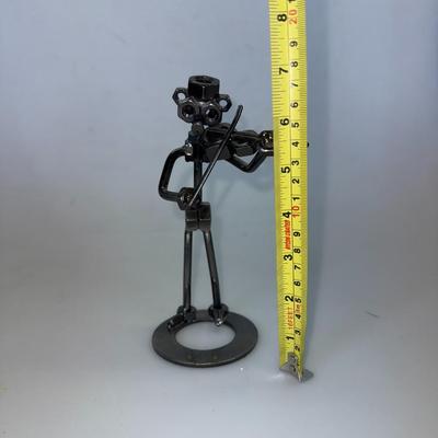 Sale Photo Thumbnail #41: Handcrafted industrial-style figure made of nuts, bolts, and metal parts playing a violin. Fun for desk or shelf décor.