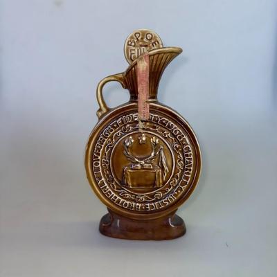 Sale Photo Thumbnail #43: Collectible whiskey bottle commemorating the Elks' centennial. Excellent condition, empty bottle.