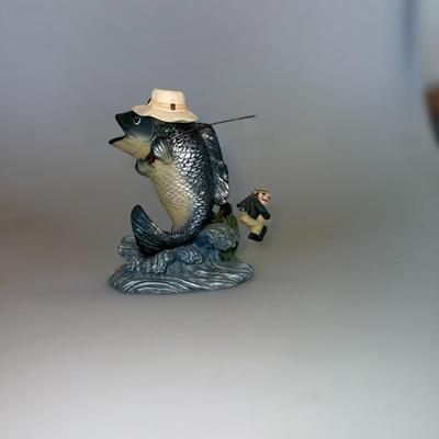 Sale Photo Thumbnail #50: Large-mouth bass with a hat and fishing pole. Humorous and detailed resin sculpture.