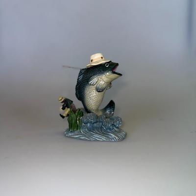 Sale Photo Thumbnail #49: Large-mouth bass with a hat and fishing pole. Humorous and detailed resin sculpture.