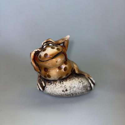 Sale Photo Thumbnail #56: Chunky, quirky frog sculpture with laid-back attitude. Ceramic.
