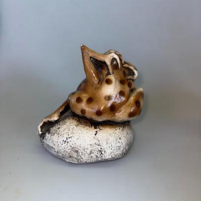 Sale Photo Thumbnail #57: Chunky, quirky frog sculpture with laid-back attitude. Ceramic.